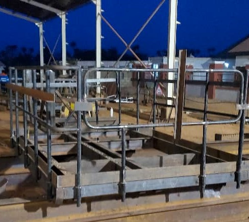 Engineers working on structural assembly