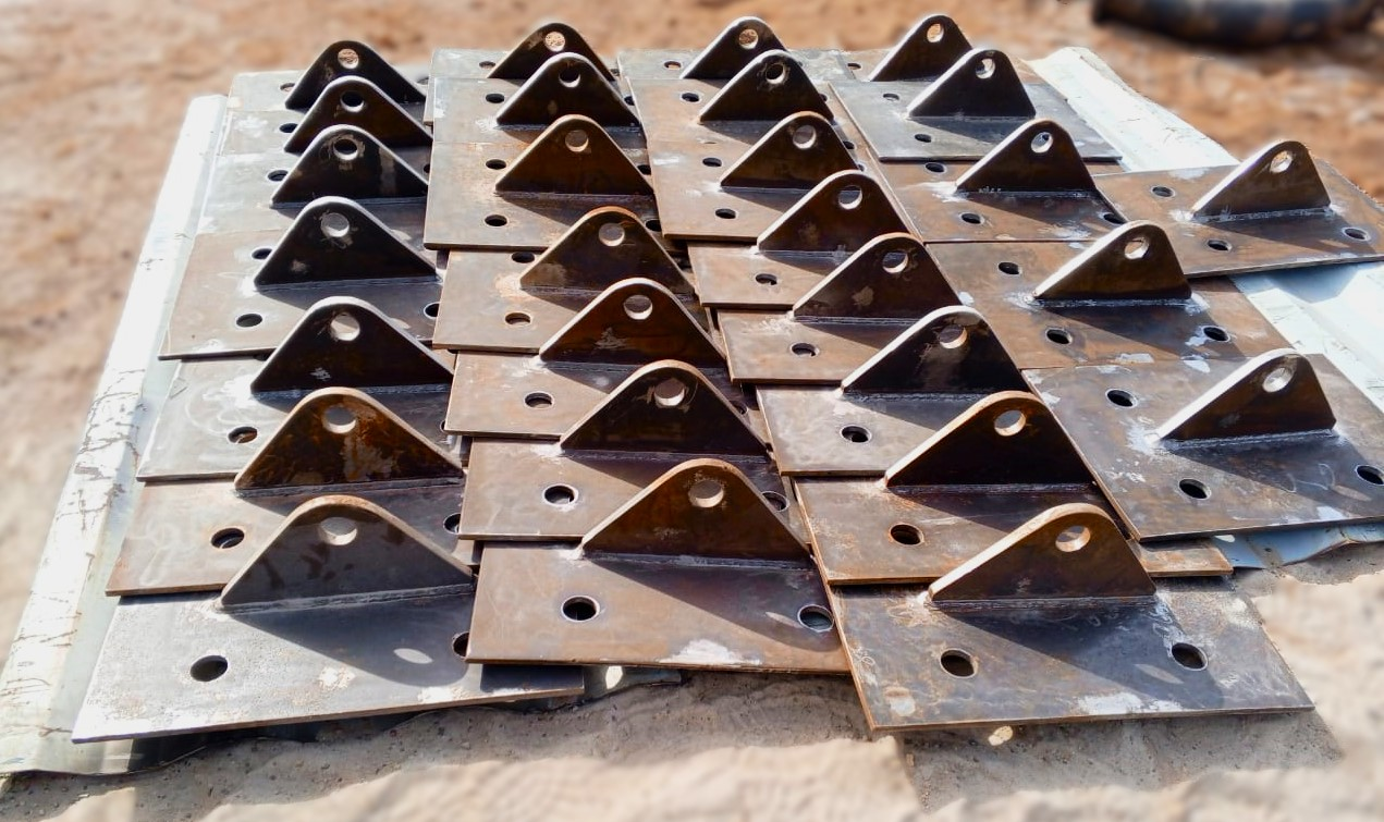 Engineers working on structural assembly